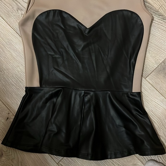 Sexy top tan and black. Fake leather. Pretty design and flattering. Size small - Picture 2 of 4
